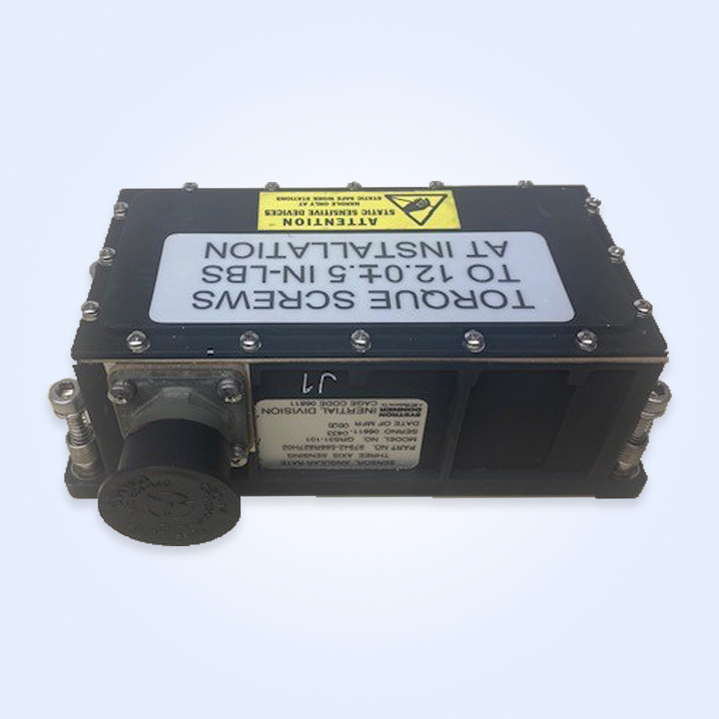 Black electronic device with a label instructing to torque screws to 12.0+0.4-5 in-lbs before installation.