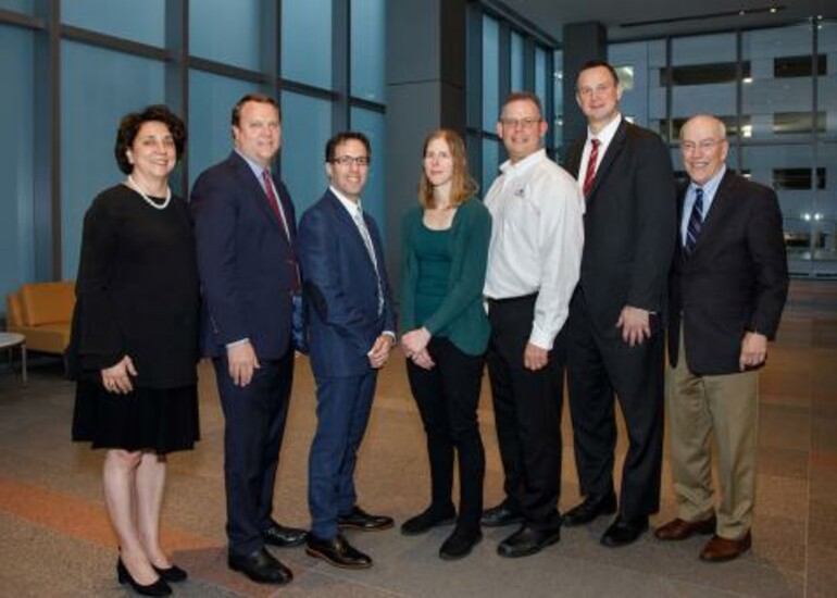Corin Williams (center) with the team that developed the LEAP Valve at Draper.