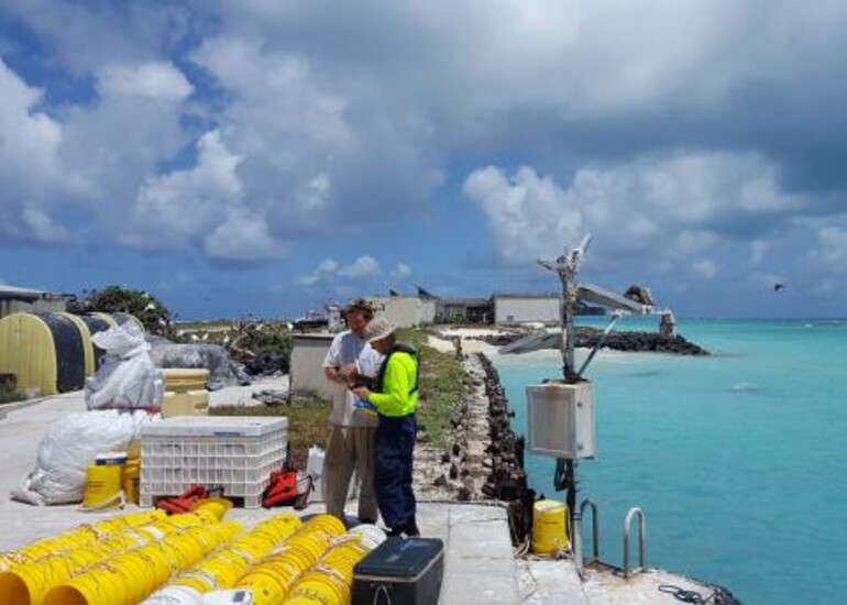 Scientists on Tern Island prepare to measure ocean microplastics during a recent expedition.