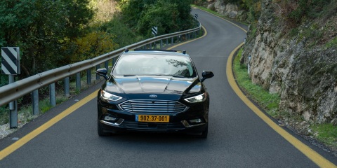 A photo shows a Ford Fusion that has been fitted with Mobileye autonomous vehicle technology. Mobileye, an Intel company, is the leader in assisted driving and a pioneer in the use of computer vision technology. The company, based in Jerusalem, became part of Intel in 2017. (Credit: Mobileye)