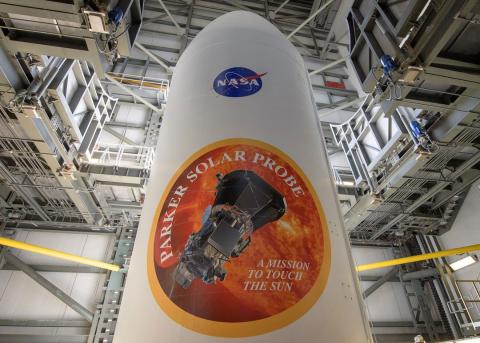 The rocket payload fairing is seen with the NASA and Parker Solar Probe emblems, Wednesday, Aug. 8, 2018 at Launch Complex 37, Cape Canaveral Air Force Station, Florida. (Photo credit: NASA/Bill Ingalls)