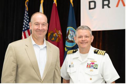 Draper President and CEO Dr. Jerry M. Wohletz and U.S. Navy Captain Jason Schneider, Commanding Officer of the Naval Ordnance Test Unit (NOTU), recently attended a groundbreaking ceremony for Draper's new strategic enhanced ground test facility in Titusville, Fla. Credit: Draper