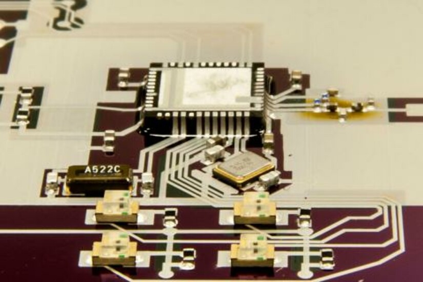 Close-up of a printed circuit board created with a 3D printer using conductive metal-based ink.