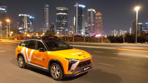 A photo shows the Mobileye autononomous vehicle(AV) operating under the MoovitAV mobility services brand. It was revealed at IAA Mobility 2021 as the production vehicle and robotaxi ride-hailing service Mobileye will bring to market beginning with Germany in 2022 through a collaboration with Munich, Germany-based SIXT Group. The service will be operated by SIXT and leverage the demand-generation of Intel subsidiary Moovit, carrying ride-hail passengers in Mobileye-owned AVs equipped with Mobileye Drive, Mobileye’s full self-driving system. (Credit: Mobileye, an Intel Company)