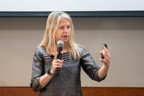 Dr. Dava Newman, Apollo Program Professor of Astronautics Humanity at MIT and Director of the MIT Media Lab, gives the keynote address at the Draper Research Symposium. Credit: Draper.
