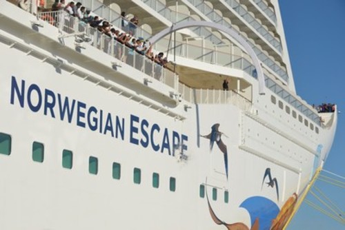 Pitbull Christens Norwegian Escape with Larger than Life Performance