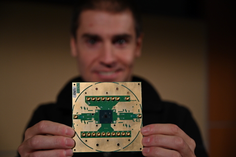 Stefano Pellerano, principal engineer at Intel Labs, holds Horse Ridge. The new cryogenic control chip will speed development of full-stack quantum computing systems, marking a milestone in the development of a commercially viable quantum computer. (Credit: Walden Kirsch/Intel Corporation)