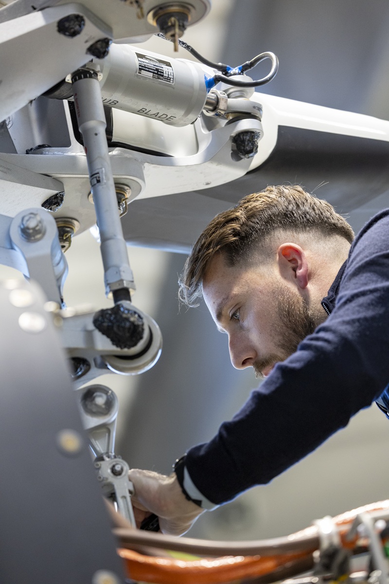 Technical crew memeber working on cables.