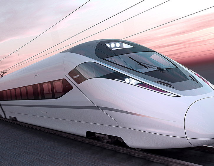 Sleek high-speed train gliding on tracks at sunset, showcasing modern design and advanced technology.