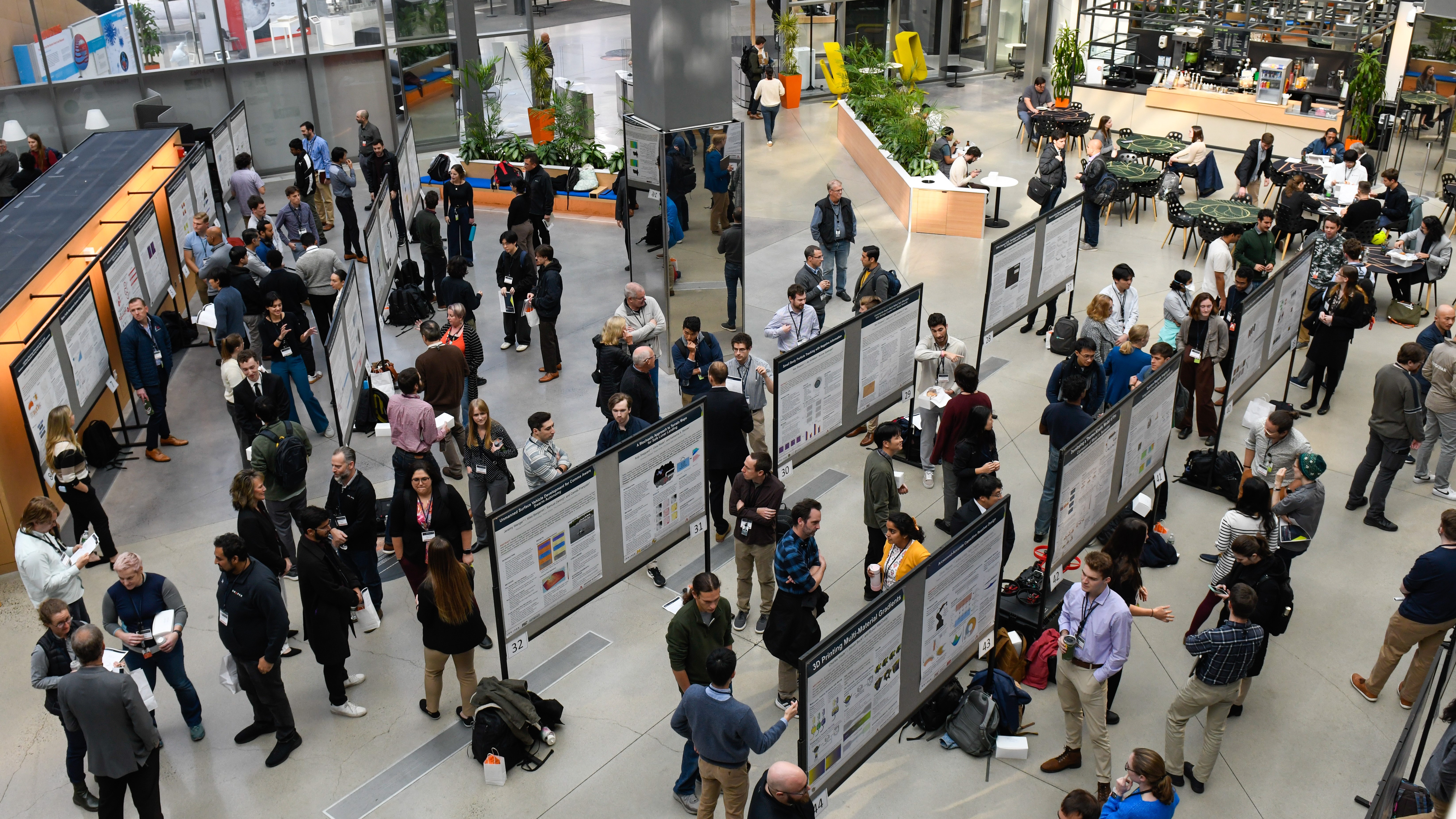 Photo of the poster session at the 2025 Draper Research Symposium