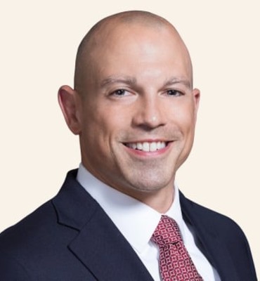 Headshot of James Savina.