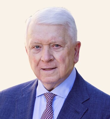 Headshot of James E. Buckman.