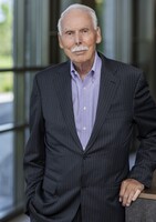 Larry E. Romrell Larry E. Romrell