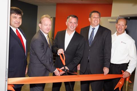 At the ribbon-cutting ceremony for Draper’s new Rapid Prototyping Center (RPC) in St. Petersburg, Florida, on April 6 were (left to right) RPC lead William Ostrowski, Draper Vice President for Engineering John Dowdle, Rep. David Jolly, SOCOM Acquisition Executive James Geurts and Greg Walbrun of Ed Taylor Construction.