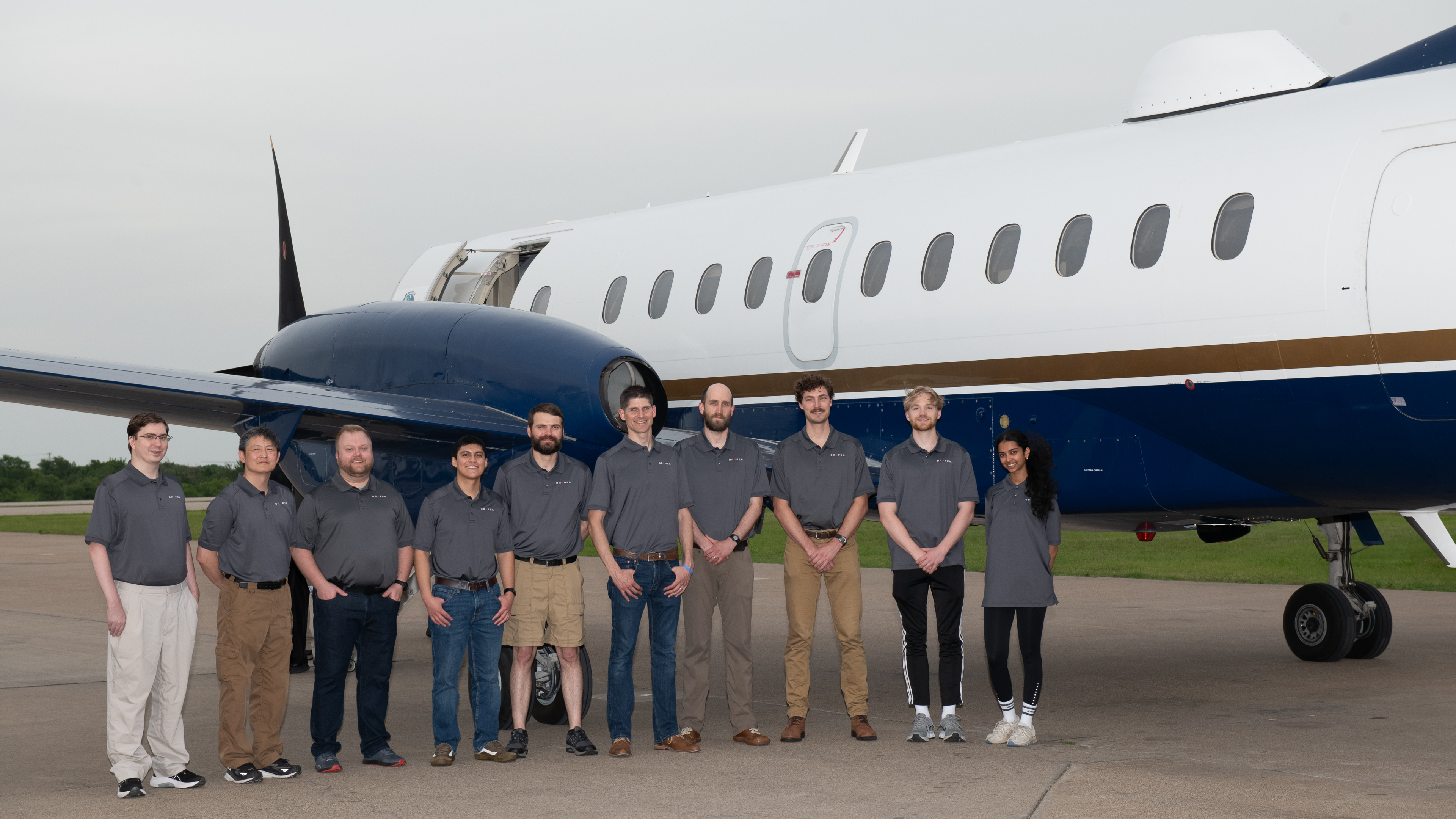 Draper’s CNS flight test team (left to right): Michael Esswein, Mike Feng, Seth Placke, Andrew Alarcon, Rick Baruffi, Mike McManus, Patrick Timmons, Matt McDermott, Chris LeMay, and Catherine Godwin  