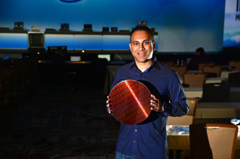 Navin Shenoy, Intel executive vice president and general manager of the Data Center Group, displays a wafer containing Intel Xeon processors during a keynote rehearsal on Monday, April 1, 2019. On April 2, Intel Corporation introduces a portfolio of data-centric tools to help its customers extract more value from their data. (Credit: Walden Kirsch/Intel Corporation)