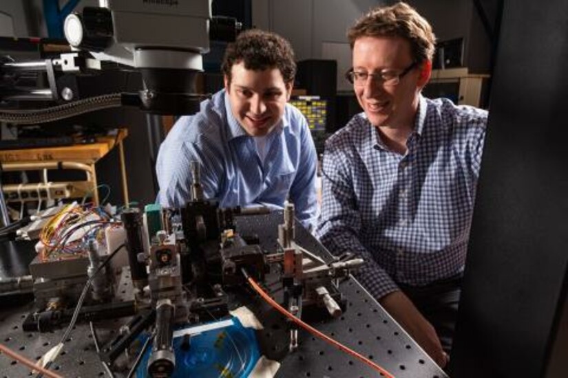 Engineers test the beamsteering capabilities of Draper’s new LiDAR-on-a-Chip in the lab.