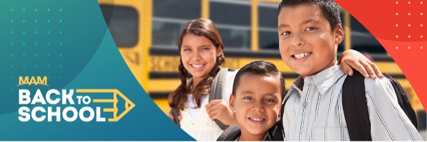 three students in front of a school bus