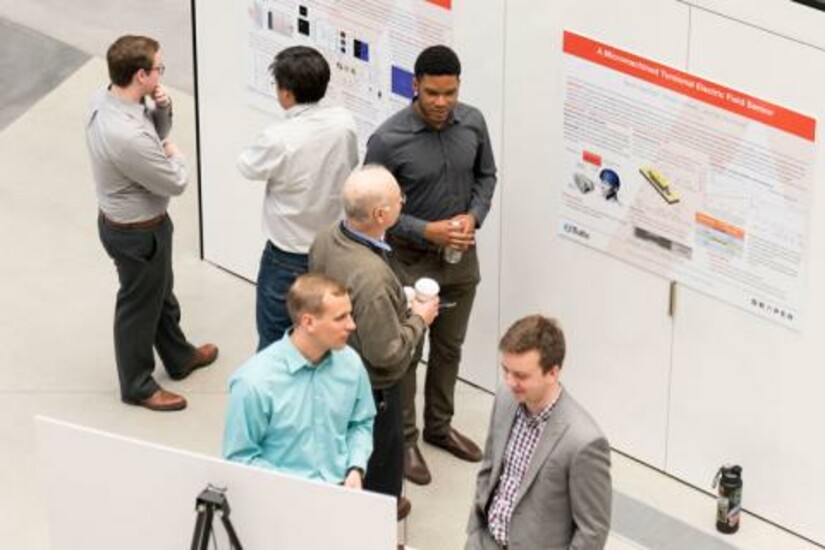 Draper Fellows presenting research at the 2018 Graduating Draper Fellow Highlights Poster Session.