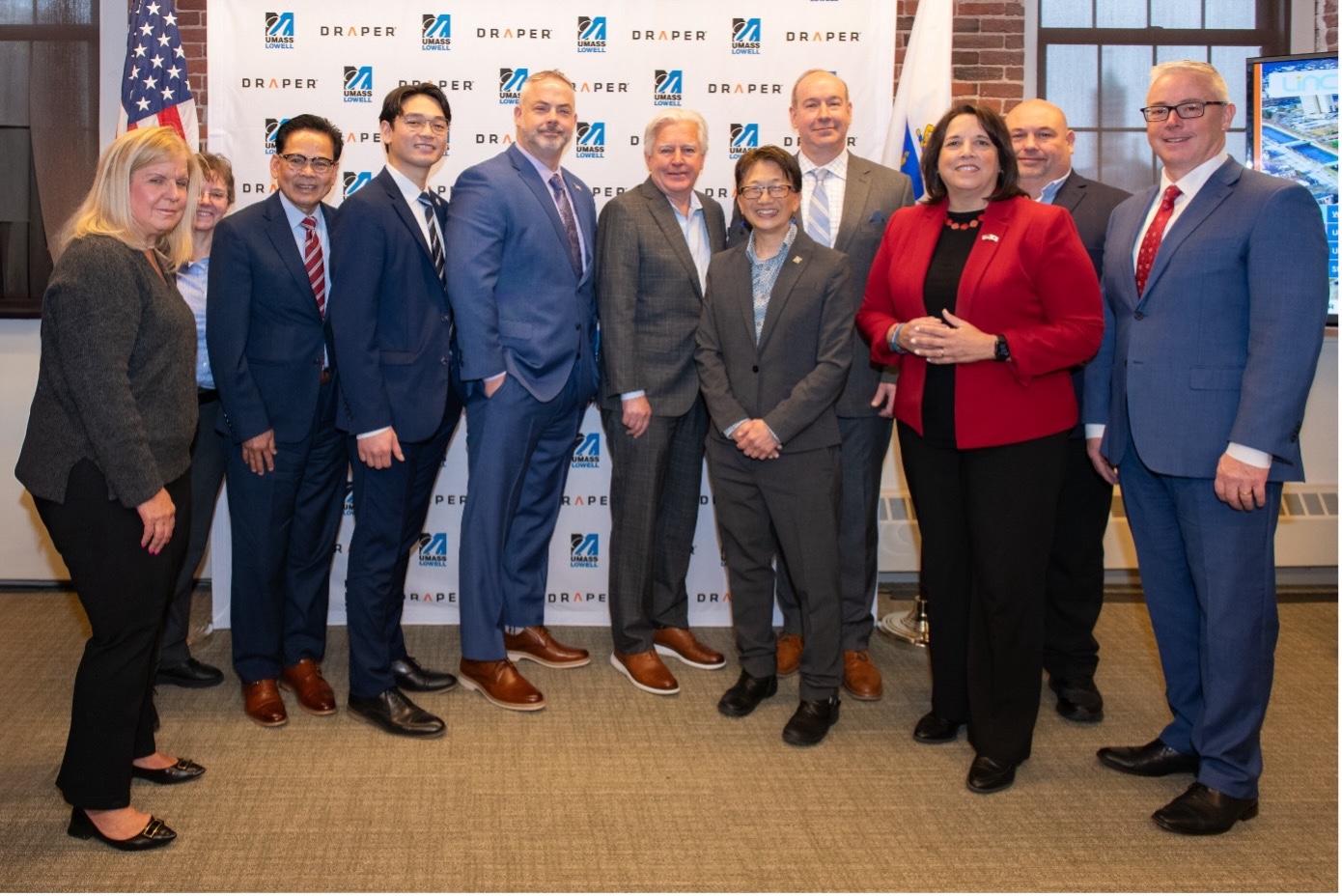 Officials that gathered at the Draper Open House in Lowell, Massachusetts on April 8, 2025.