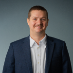 Larry Kom Headshot