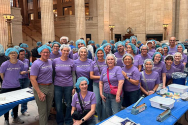 Brunswick Employees Pack 500,000 Meals for Chicago Families