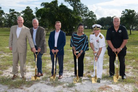 Attendees at a groundbreaking ceremony for Draper's new strategic enhanced ground test facility in Titusville, Fla. include Draper President and CEO Dr. Jerry M. Wohletz; Draper Board of Director Chairman David Shedd; Draper Vice President and General Manager of Navy Strategic Systems Robert Bacon; Dr. Christyl Johnson, Deputy Director for Technology and Research Investments at NASA’s Goddard Space Flight Center; U.S. Navy Captain Jason Schneider, Commanding Officer of the Naval Ordnance Test Unit (NOTU); and City of Titusville Mayor Dan Diesel. Credit: Draper
