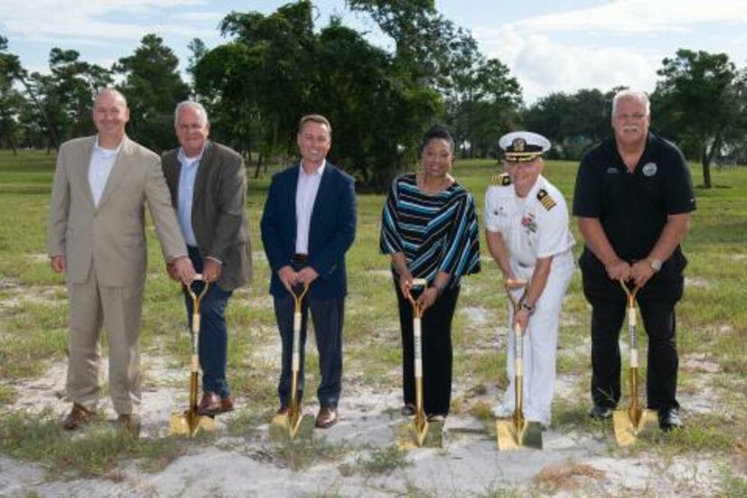 Draper executives and officials break ground for a new test facility in Titusville, Florida.