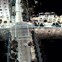Aerial view of a city intersection with distorted buildings and streets.