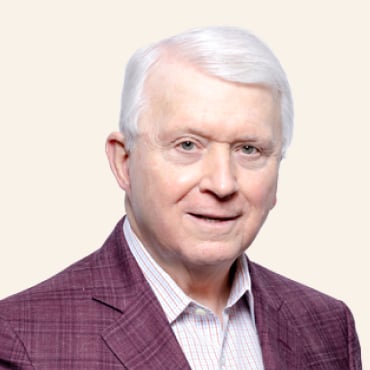 Headshot of James E. Buckman