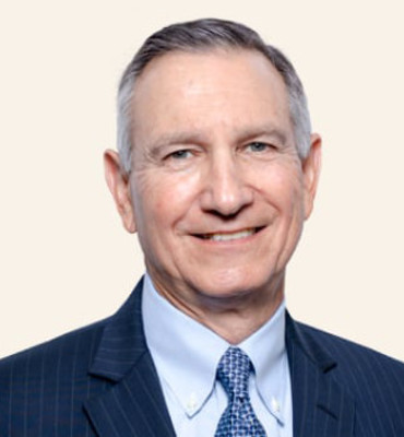 Headshot of Ronald L. Rickles.