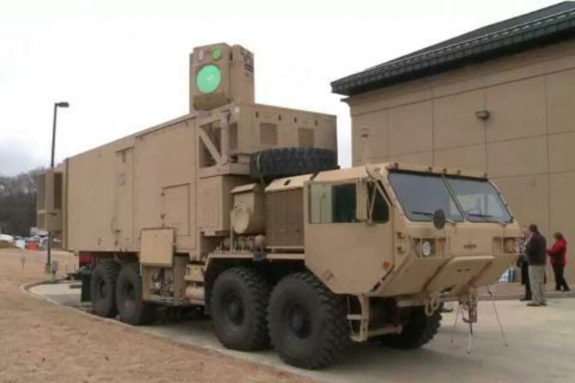Large, tan U.S. Army transport vehicle