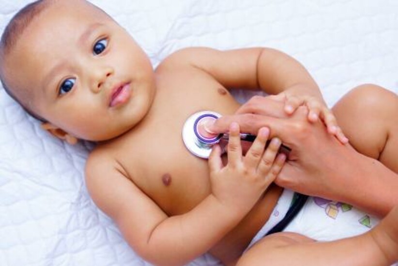 A baby undergoing a heart check-up