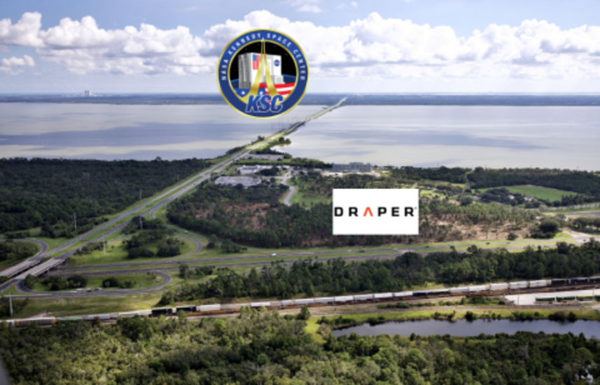 Aerial view of Kennedy Space Center with Draper logo, showcasing the scenic landscape and infrastructure.