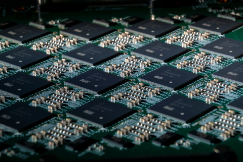 A close-up shows an Intel Nahuku board, each of which contains eight to 32 Intel Loihi neuromorphic research chips. Intel’s latest neuromorphic computing system, Pohoiki Springs, was unveiled in March 2020. It is made up of 24 Nahuku boards with 32 chips each, integrating a total of 768 Loihi chips. (Credit: Tim Herman/Intel Corporation)