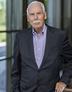 Larry E. Romrell Headshot