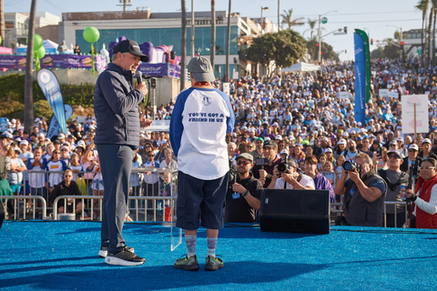 Skechers Walk Founder Michael Greenberg joins longtime Friendship Foundation member Jacob Dominguez at the 2023 Skechers Pier to Pier Friendship Walk in Manhattan Beach, CA. (Photo: Ian Logan Photography)