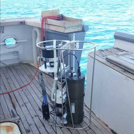 Submersible sampling pump on a boat deck, used for collecting microplastic particles from the ocean.