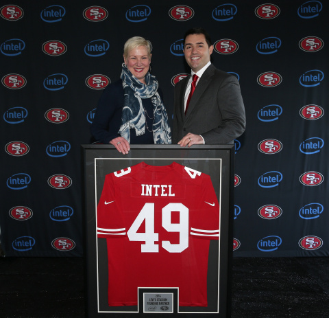 Intel Chief Marketing Officer Deborah Conrad and San Francisco 49er CEO Jed York with commemorative jersey honoring the announcement that Intel would be a Founding Partner and a preferred technology provider of the new Levi's Stadium in Santa Clara, Calif. (Photo: Business Wire)