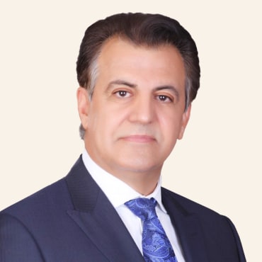 Headshot of Sy Esfahani