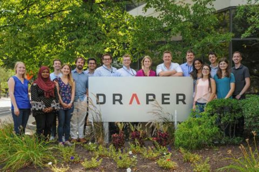 Dr. Jason Holder with his summer internship team at Draper