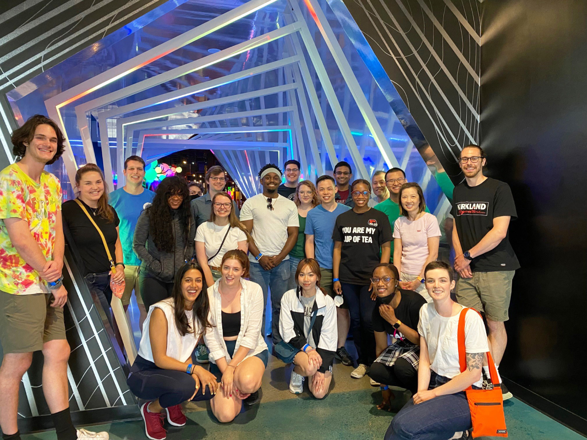Early Career Members at a group outing at Level 99 in Natick, MA.
