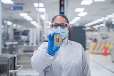 A worker in the Costa Rica Assembly Test (CRAT) facility in San Jose, Costa Rica, displays an Intel Xeon 6 processor with Efficient-cores (code-named Sierra Forest) in May 2024. The first member of the Intel Xeon 6 processor family was introduced June 4, 2024, at Computex in Taipei, Taiwan. (Credit: Intel Corporation)