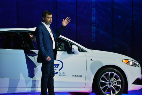 Professor Amnon Shashua, senior vice president of Intel and CEO/CTO of Mobileye, arrives on stage from the backseat of an autonomous car during Intel's preshow keynote at the 2018 Consumer Electronics Show (CES) on Monday, Jan. 8, 2018, in Las Vegas. Shashua joined Brian Krzanich, Intel Corporation chief executive officer, during the keynote. Intel displays how the power of data is affecting our daily lives at the event, which runs Jan. 9-12. (Credit: Walden Kirsch/Intel Corporation)
